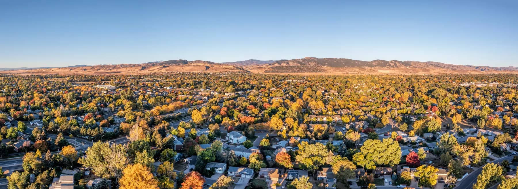 A Colorado neighbourhood with the Front Range mountains beyond