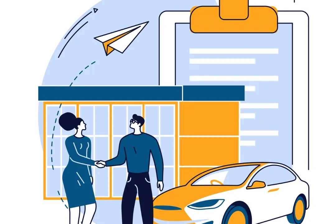 Two people shaking hands after making a car purchase