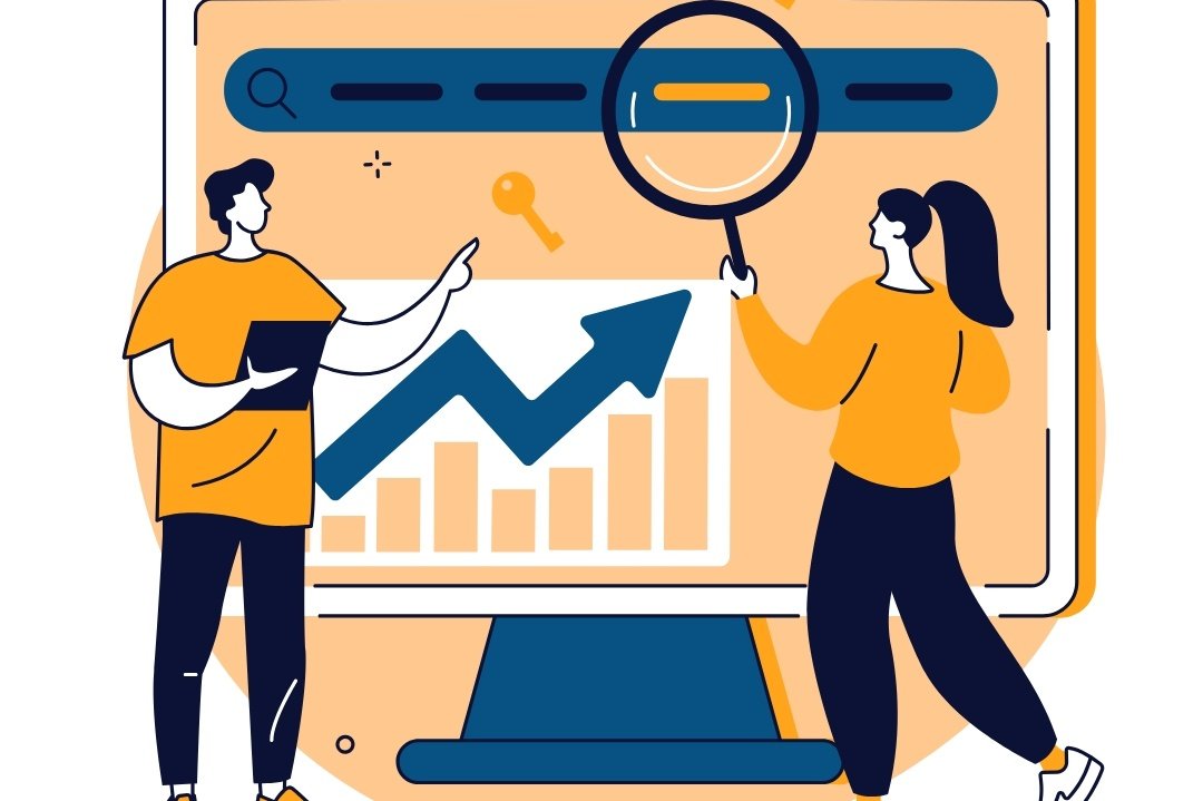 Graphic of two people analyzing keyword opportunities on a desktop